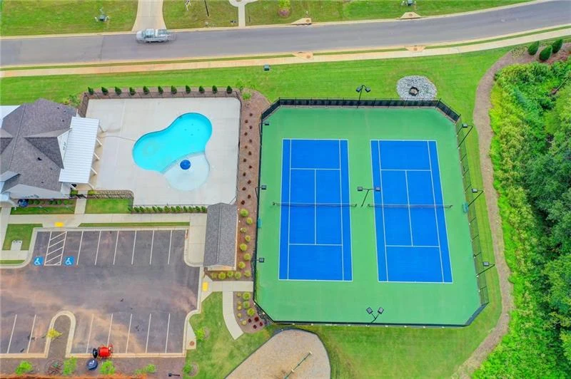 Shared community pool and tennis courts