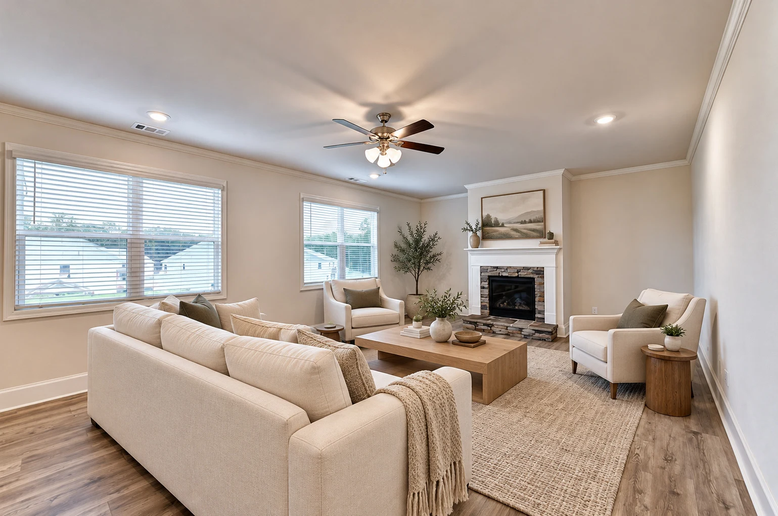 Family room with fireplace and windows — virtually staged